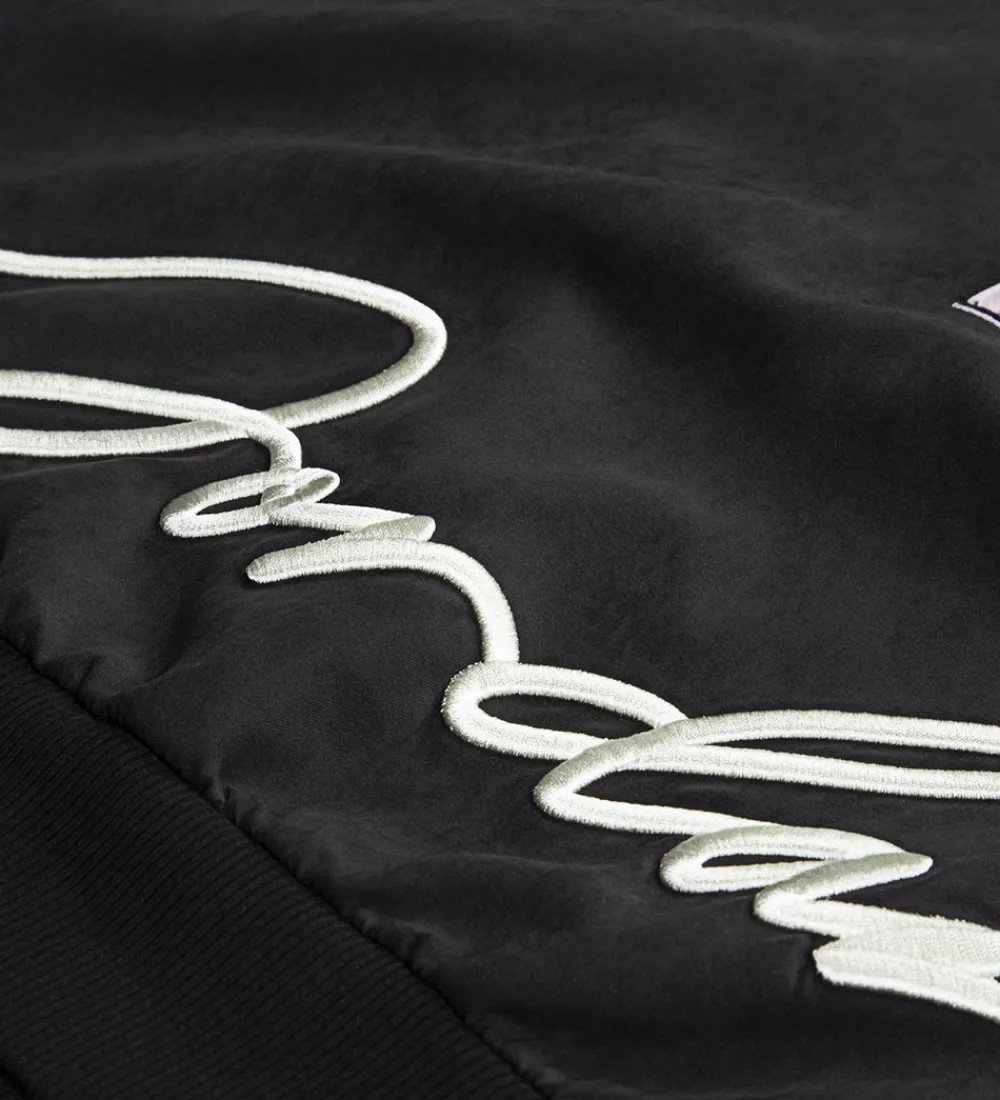 Toppe-Jordan Top - Off Noir m. Signatur